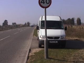 23Mar03 - surveillance van recording vehicle registrations and possibly biometrics on the A417 west of Fairford, Gloucestershire, UK.